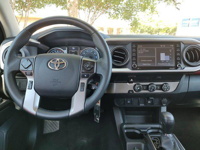 used 2023 Toyota Tacoma car, priced at $29,989
