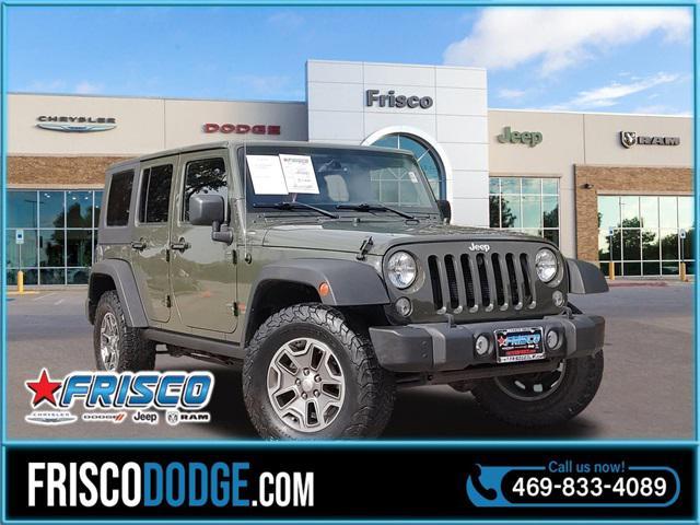 used 2015 Jeep Wrangler Unlimited car, priced at $23,659