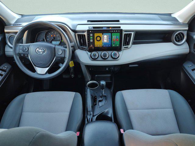 used 2014 Toyota RAV4 car, priced at $10,000