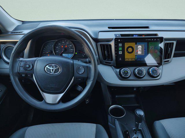 used 2014 Toyota RAV4 car, priced at $10,000