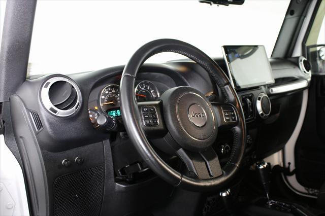 used 2016 Jeep Wrangler Unlimited car, priced at $16,840