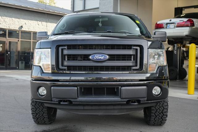 used 2014 Ford F-150 car, priced at $16,810