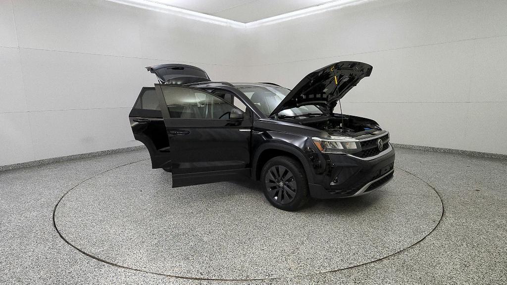 used 2023 Volkswagen Taos car, priced at $17,178