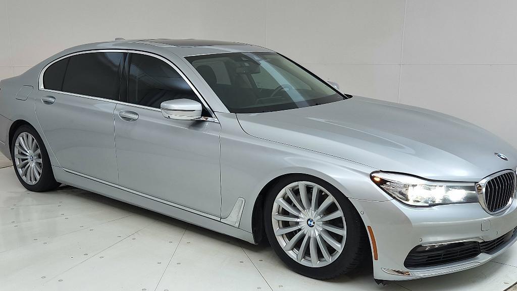 used 2016 BMW 740 car, priced at $16,744