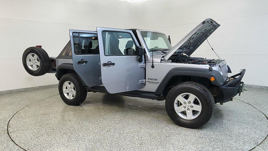 used 2015 Jeep Wrangler Unlimited car, priced at $16,107