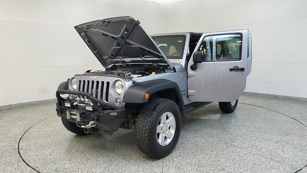 used 2015 Jeep Wrangler Unlimited car, priced at $16,107