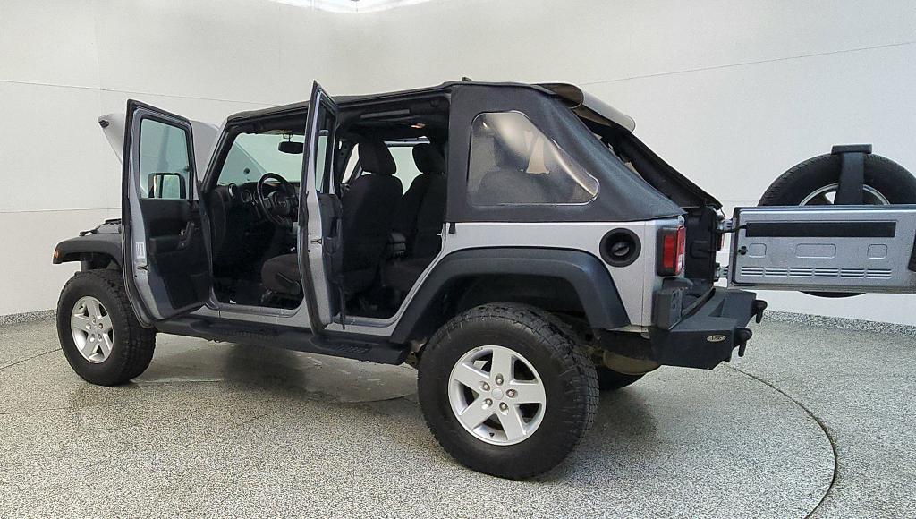 used 2015 Jeep Wrangler Unlimited car, priced at $16,107