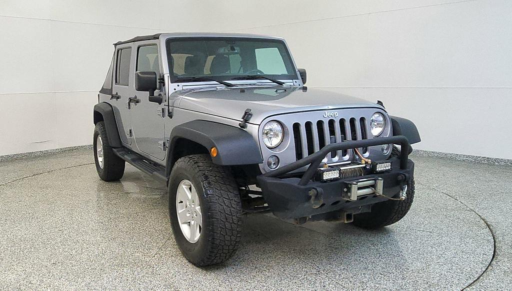 used 2015 Jeep Wrangler Unlimited car, priced at $16,107