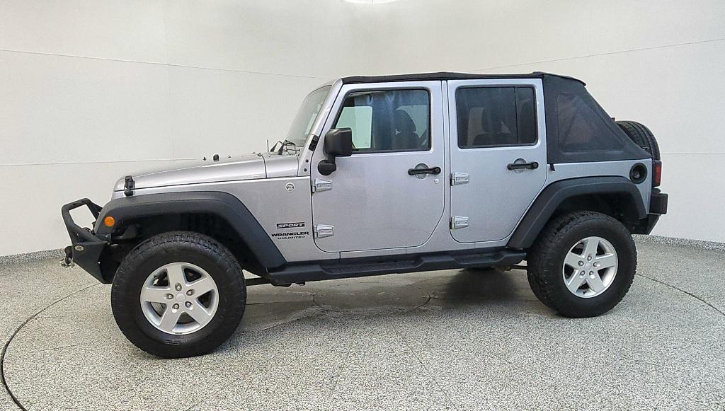 used 2015 Jeep Wrangler Unlimited car, priced at $16,107