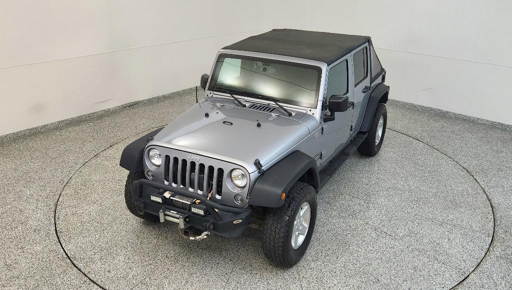 used 2015 Jeep Wrangler Unlimited car, priced at $16,107