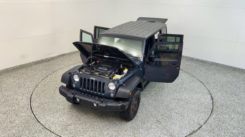used 2016 Jeep Wrangler Unlimited car, priced at $14,583