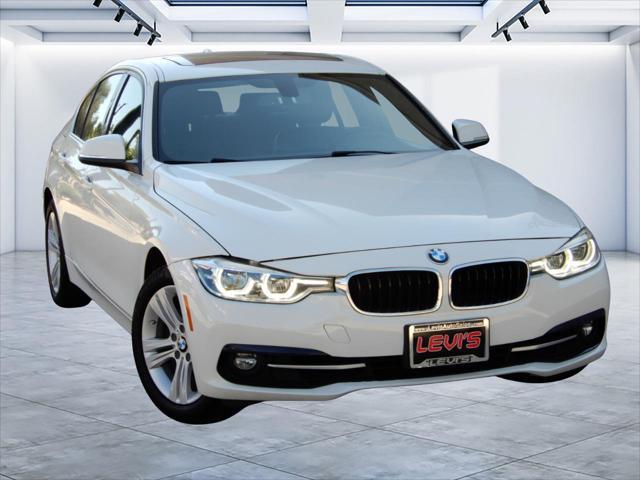 used 2018 BMW 330 car, priced at $20,998