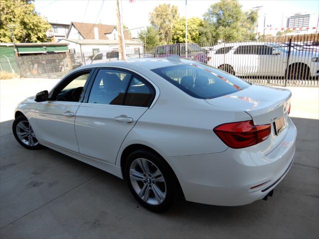 used 2018 BMW 330 car, priced at $20,998