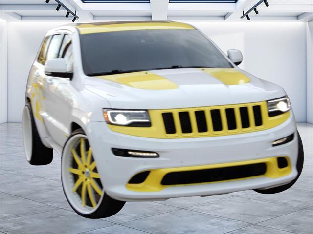 used 2014 Jeep Grand Cherokee car, priced at $32,998