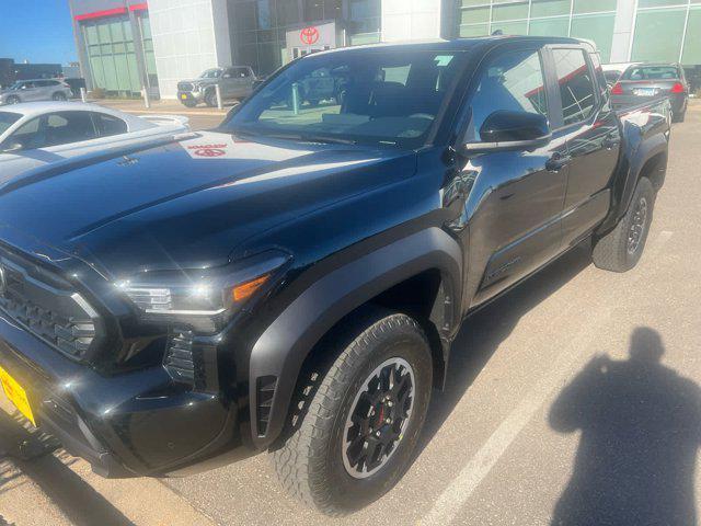 used 2024 Toyota Tacoma car, priced at $49,990