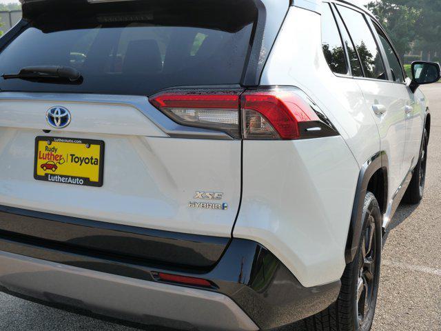 used 2021 Toyota RAV4 Hybrid car, priced at $31,485