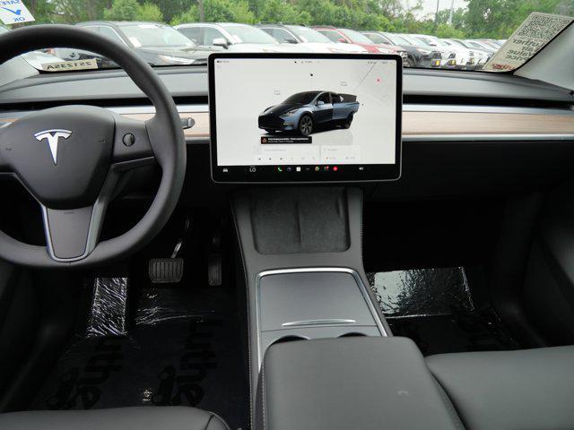 used 2024 Tesla Model Y car, priced at $36,485