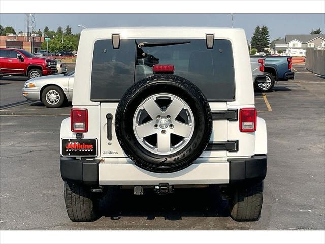 used 2011 Jeep Wrangler Unlimited car, priced at $15,588