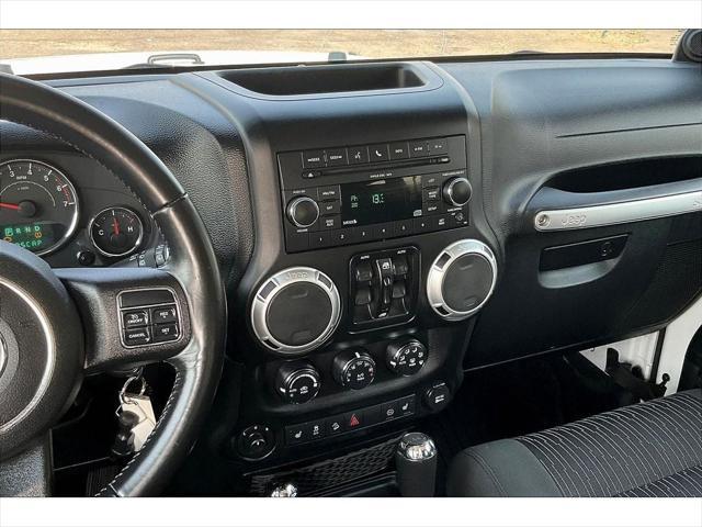 used 2011 Jeep Wrangler Unlimited car, priced at $15,588