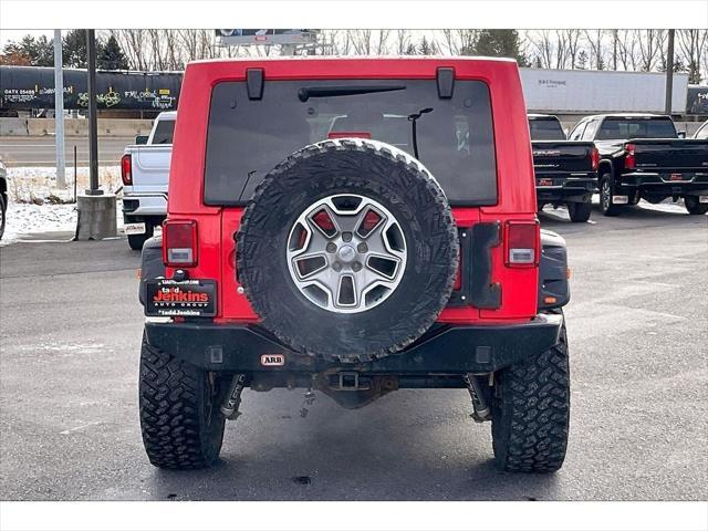 used 2013 Jeep Wrangler Unlimited car, priced at $24,495