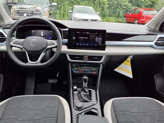 new 2025 Volkswagen Taos car, priced at $32,053