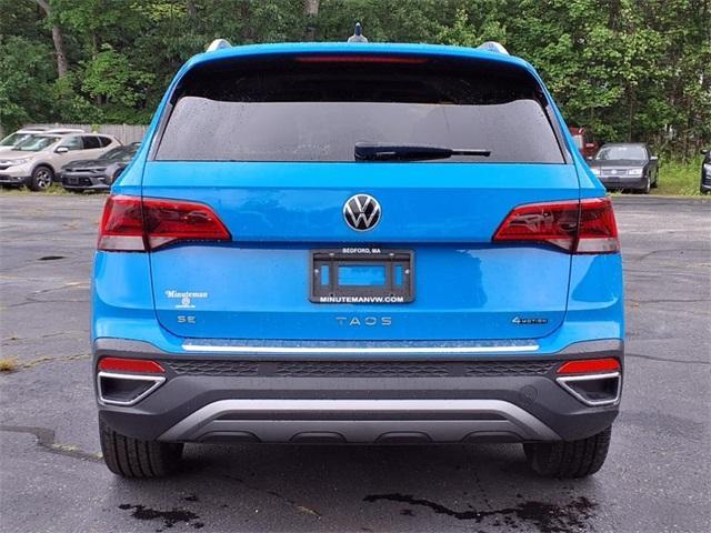 used 2023 Volkswagen Taos car, priced at $27,498