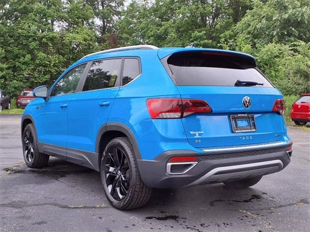 used 2023 Volkswagen Taos car, priced at $27,498