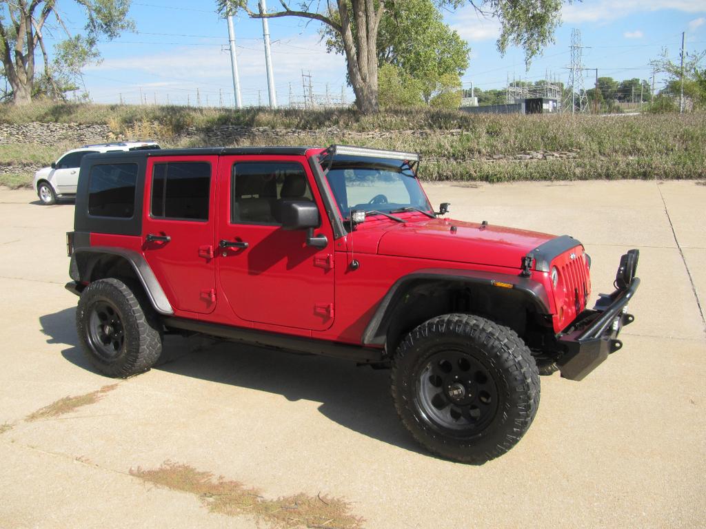 used 2011 Jeep Wrangler Unlimited car, priced at $17,900