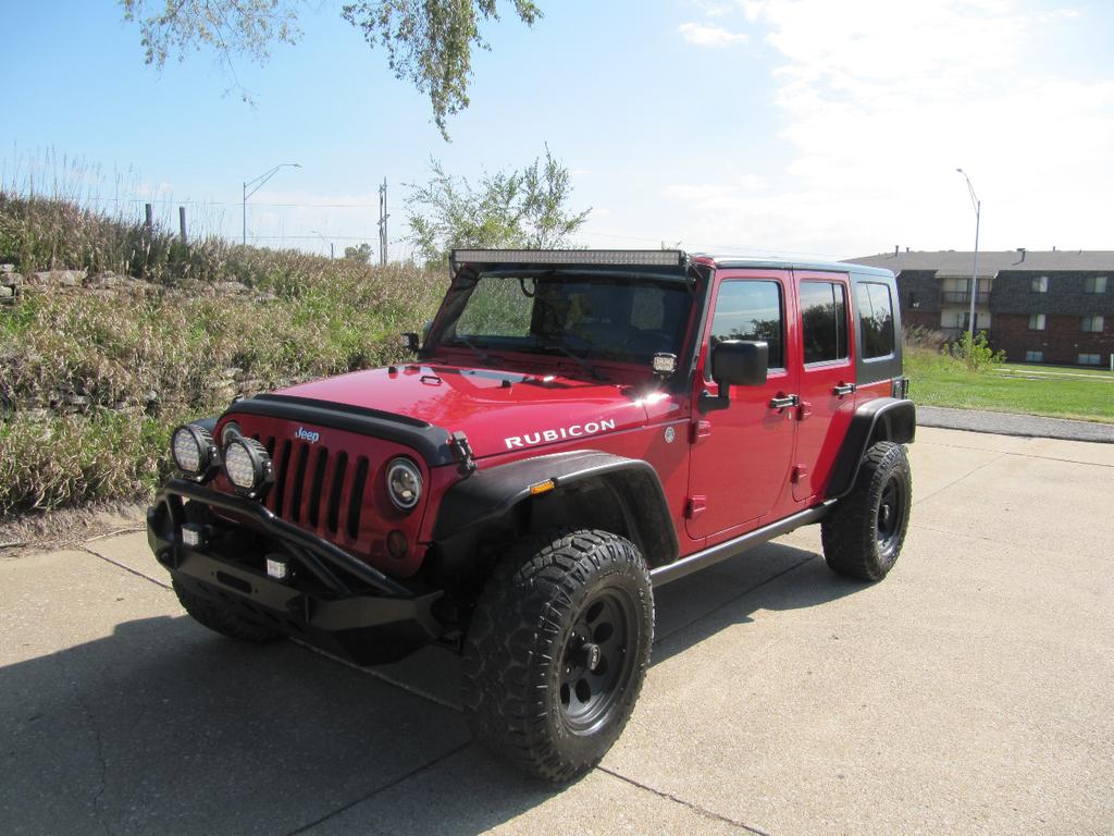 used 2011 Jeep Wrangler Unlimited car, priced at $17,900