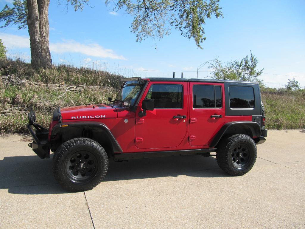 used 2011 Jeep Wrangler Unlimited car, priced at $17,900
