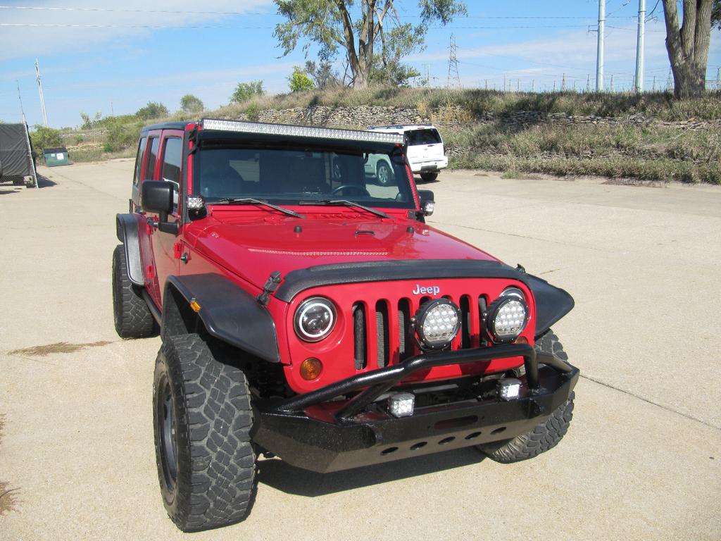 used 2011 Jeep Wrangler Unlimited car, priced at $17,900