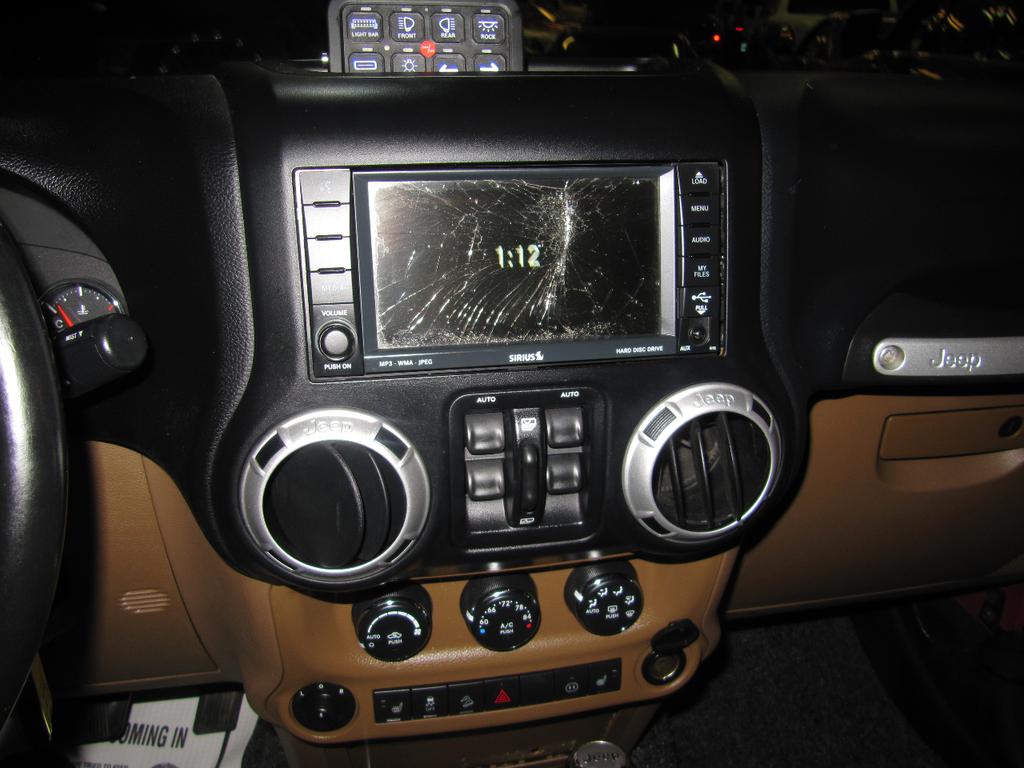 used 2011 Jeep Wrangler Unlimited car, priced at $17,900