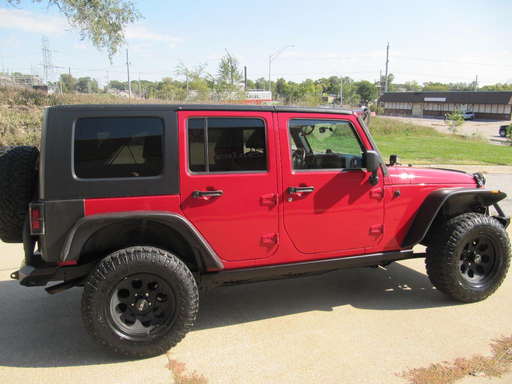 used 2011 Jeep Wrangler Unlimited car, priced at $17,900