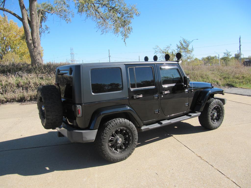used 2010 Jeep Wrangler Unlimited car, priced at $17,900