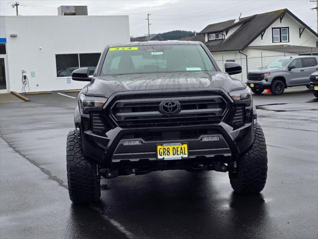 used 2024 Toyota Tacoma car, priced at $49,995