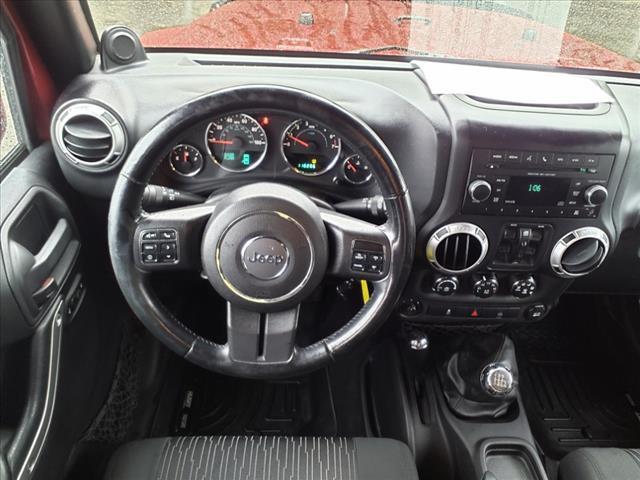 used 2012 Jeep Wrangler Unlimited car, priced at $15,695