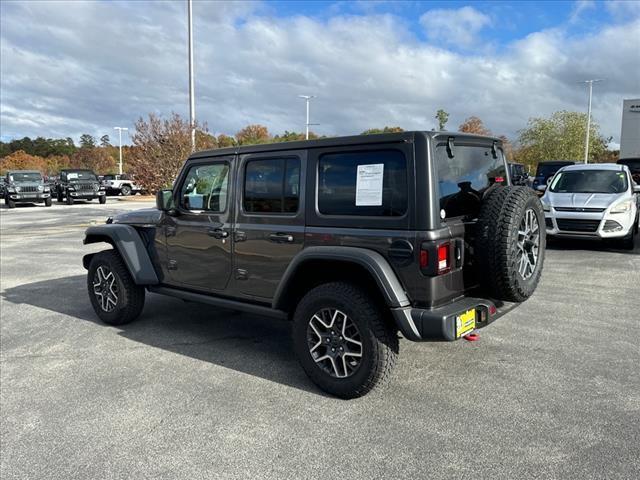 used 2021 Jeep Wrangler Unlimited car, priced at $34,976