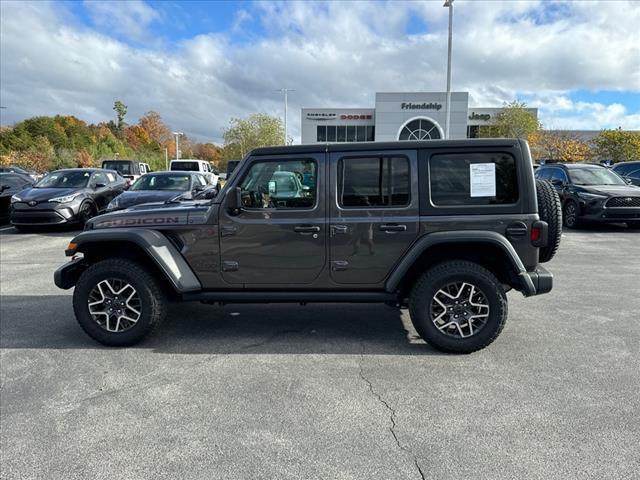 used 2021 Jeep Wrangler Unlimited car, priced at $34,976