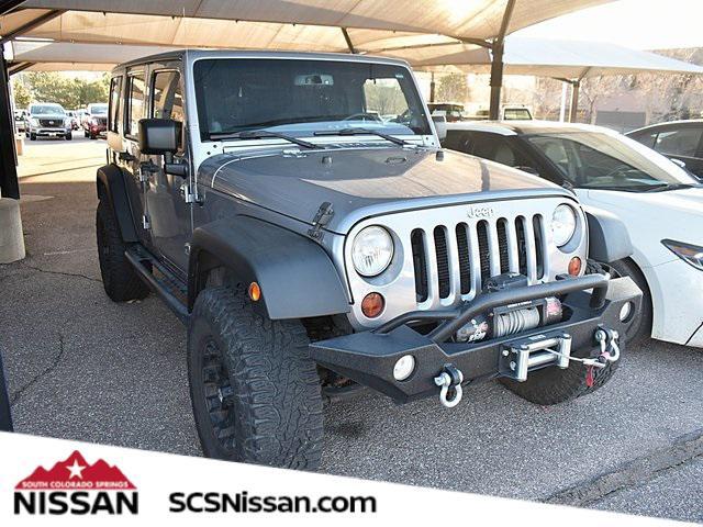 used 2013 Jeep Wrangler Unlimited car, priced at $16,991