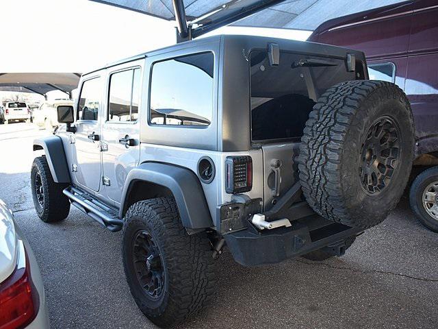 used 2013 Jeep Wrangler Unlimited car, priced at $16,991