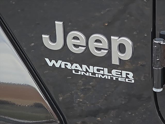 used 2021 Jeep Wrangler Unlimited car, priced at $31,452