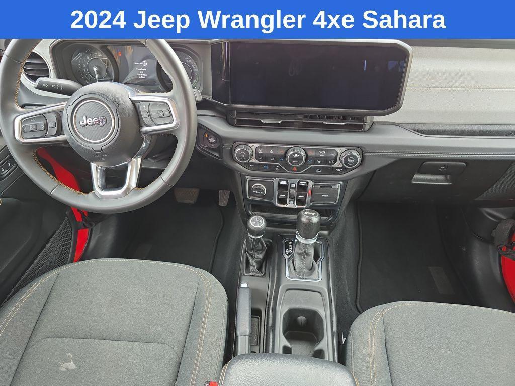used 2024 Jeep Wrangler 4xe car, priced at $33,821