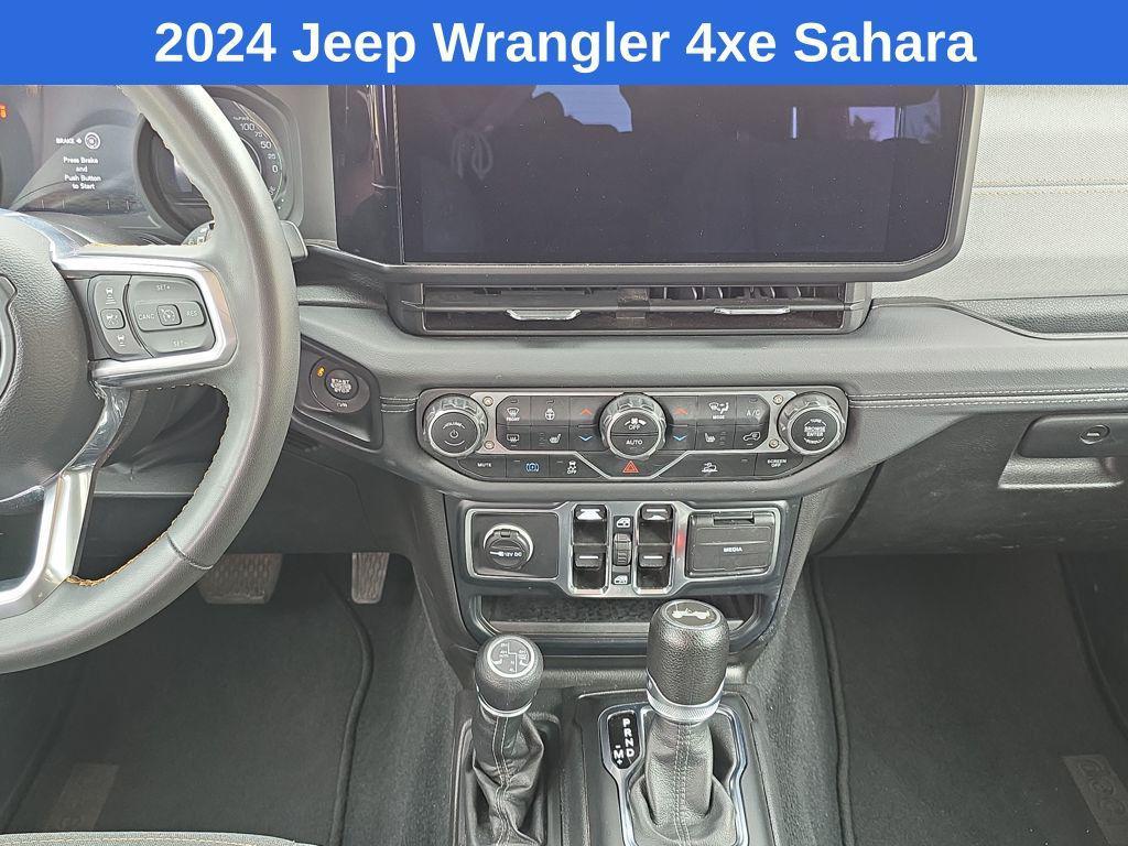 used 2024 Jeep Wrangler 4xe car, priced at $33,821