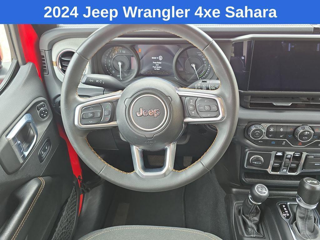 used 2024 Jeep Wrangler 4xe car, priced at $33,821