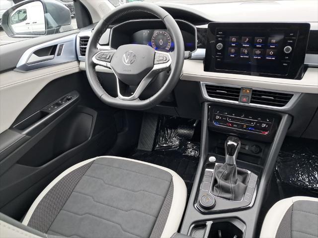 new 2025 Volkswagen Taos car, priced at $30,937