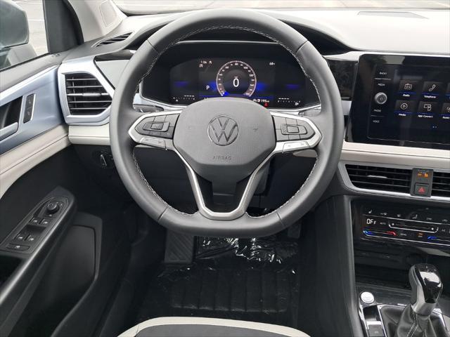 new 2025 Volkswagen Taos car, priced at $30,937