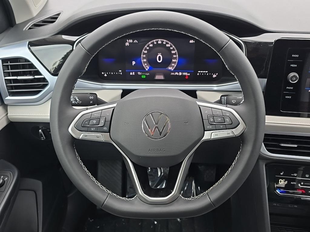 new 2025 Volkswagen Taos car, priced at $30,900