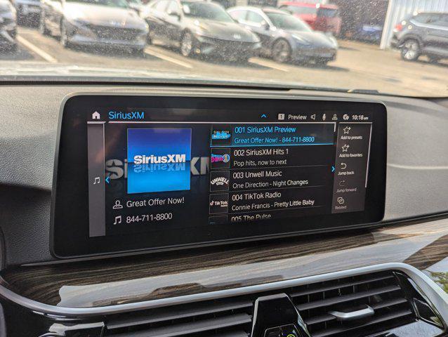 used 2023 BMW 530e car, priced at $36,016