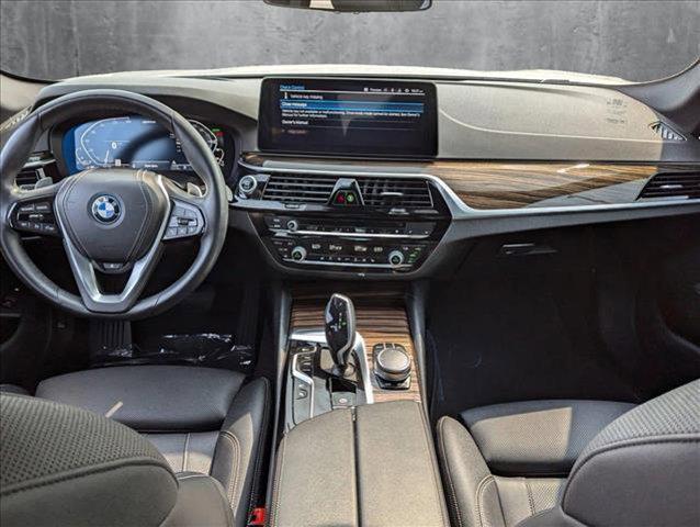 used 2023 BMW 530e car, priced at $31,604