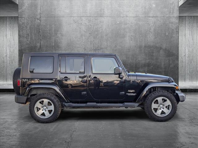 used 2010 Jeep Wrangler Unlimited car, priced at $16,156